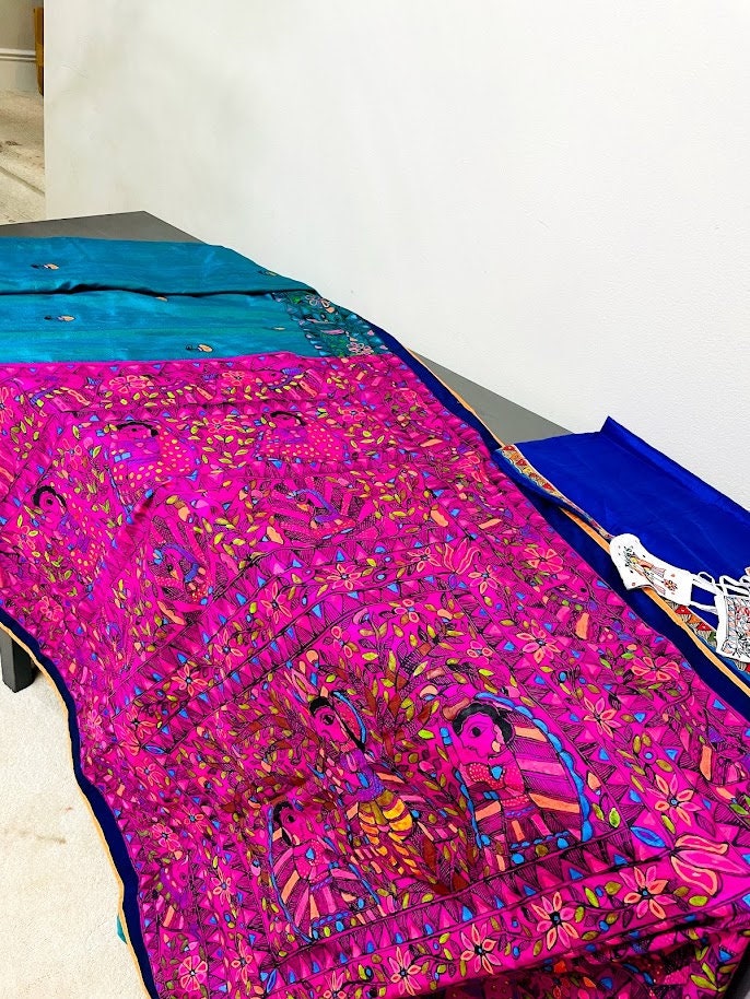 Madhubani saree - handpainted saree with Radha and Kanha and dancing peacocks with open feathers on the pallu - Vibha By Veena