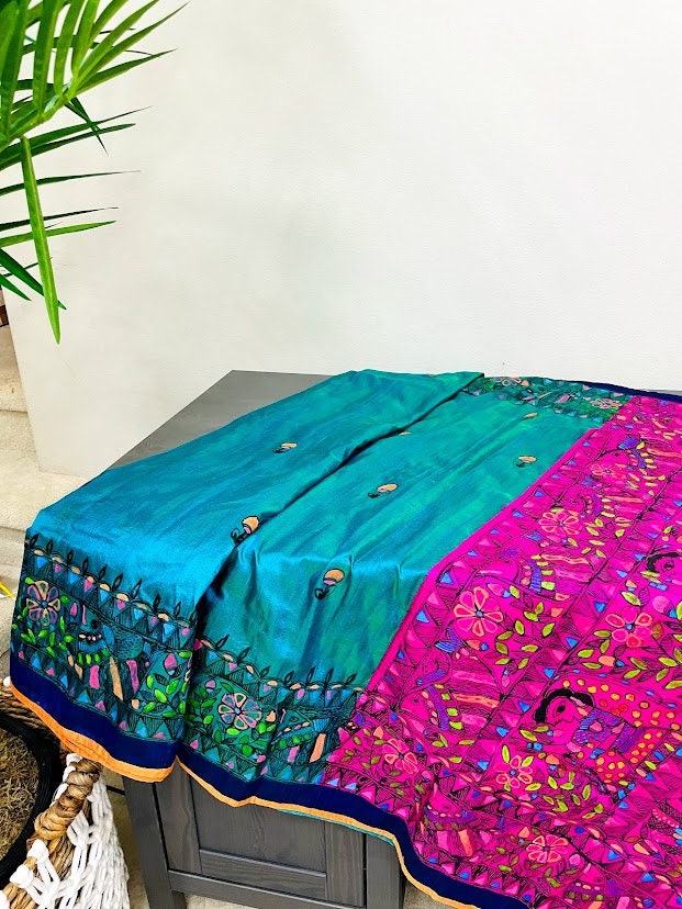 Madhubani saree - handpainted saree with Radha and Kanha and dancing peacocks with open feathers on the pallu - Vibha By Veena